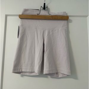 Aritzia/TNA- Atmosphere, Butter 7inch biker shorts- size XS, colour Grey Lilac